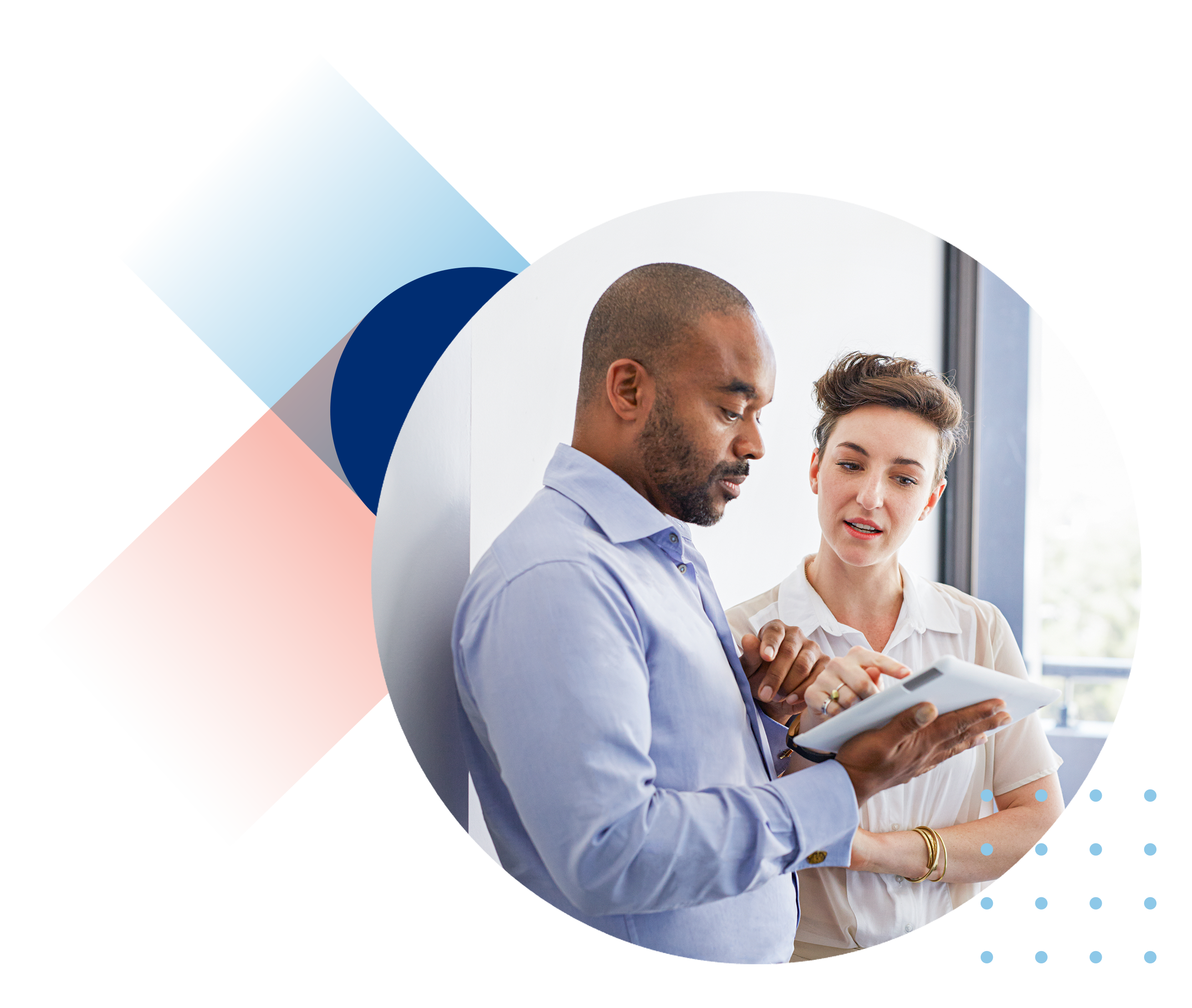 A man and a woman examining a document. 